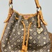 Dooney & Bourke Bucket Shoulder Bag Purse Tote Cinch Heart Charm Tassels