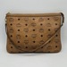 MCM Visetos Monogram Wristlet Clutch in Cognac