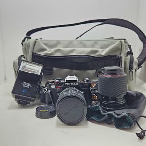 Pentax Program Plus 70-210mm and 28-85mm lenses 