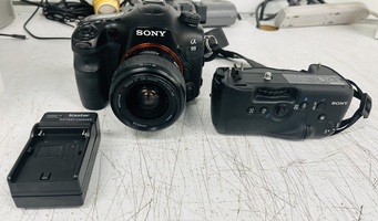 Sony Alpha SLT-A99 Digital SLR Camera + lens+Vertical grip+battery+charger