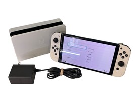 Nintendo Switch – OLED Model w/White Joy-Con