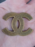 CHANEL Gold-Tone CC Logo Brooch – Textured Woven Design (B21 Collection)